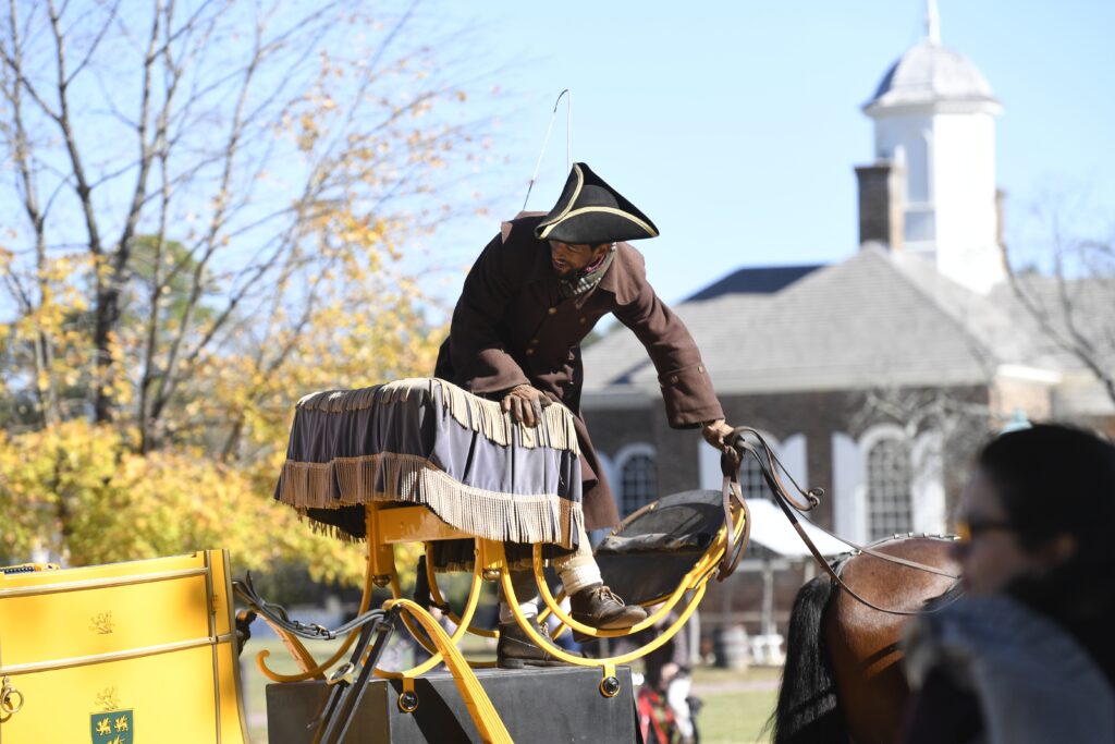 Colonial Williamsburg museum buildings in Virginia, showcasing a historic settlement with autumn scenery in November.